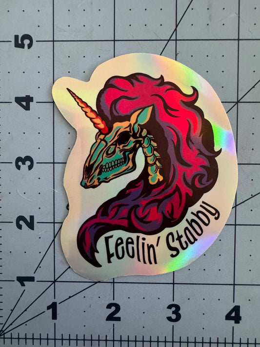 Feelin’ Stabby Skeleton Unicorn Sticker – Holographic Sass with Horns